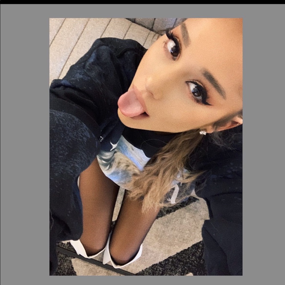 Selling exclusive Lalapalooza Ariana NASA merch